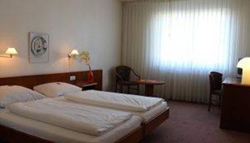 Imagen de la habitación del Hotel La Taverna. Foto 14