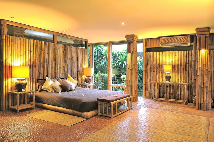 Imagen de la habitación del Hotel La Taverna Suites. Foto 4