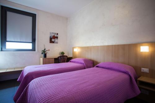 Imagen de la habitación del Hotel La Tavernetta. Foto 14