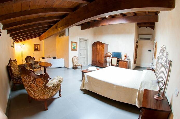 Imagen de la habitación del Hotel La Tavola Rotonda. Foto 12