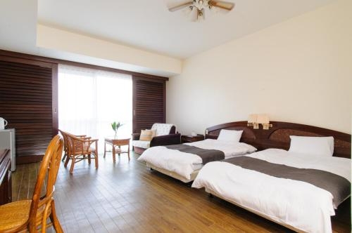 Imagen de la habitación del Hotel La Teada Iriomote Resort. Foto 6