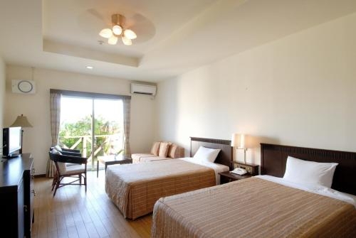 Imagen de la habitación del Hotel La Teada Iriomote Resort. Foto 7