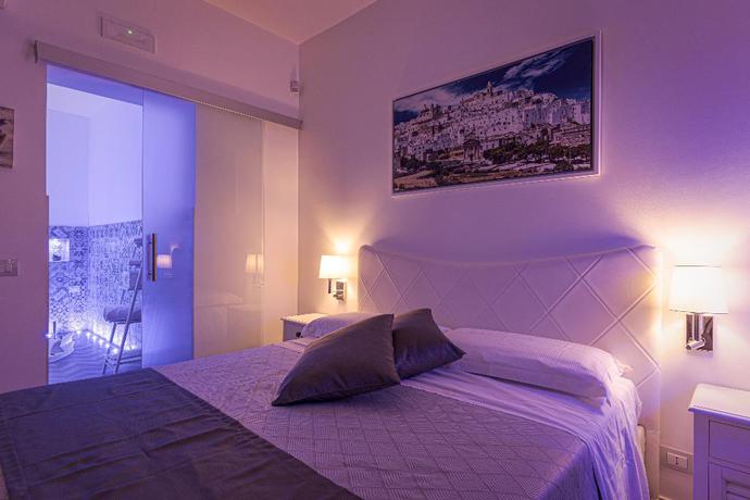 Imagen de la habitación del Hotel La Terrazza sulla Rupe. Foto 11