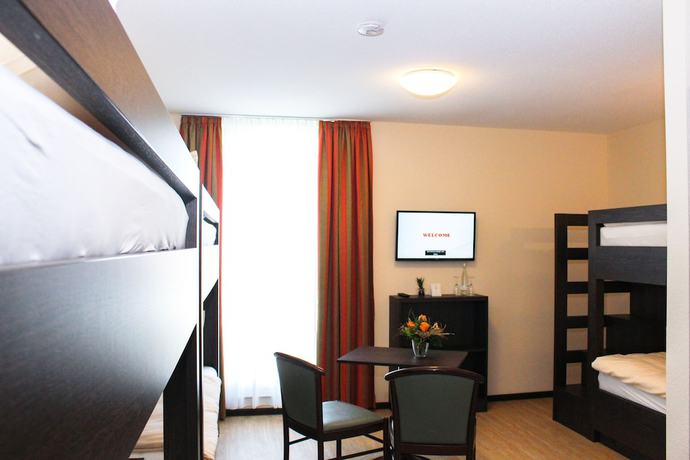 Imagen de la habitación del Hotel La Toscana Nähe Europapark Mit Ticket Garantie. Foto 3