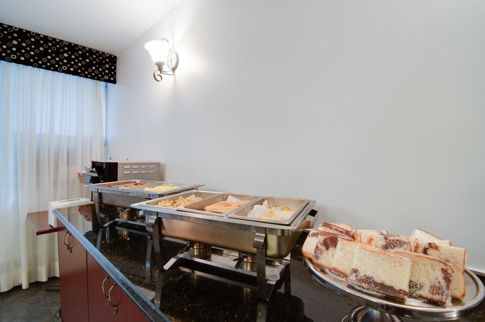 Imagen del bar/restaurante del Hotel La Tour Belvedere Apartment. Foto 2