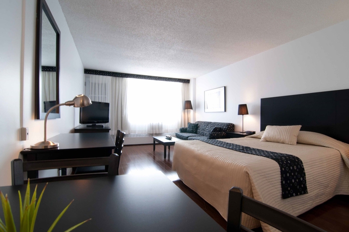 Imagen de la habitación del Hotel La Tour Belvedere Apartment. Foto 8