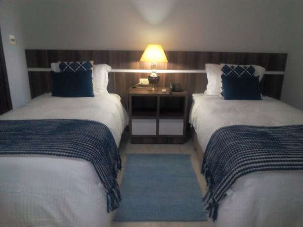 Imagen de la habitación del Hotel La Tour Boutique. Foto 10