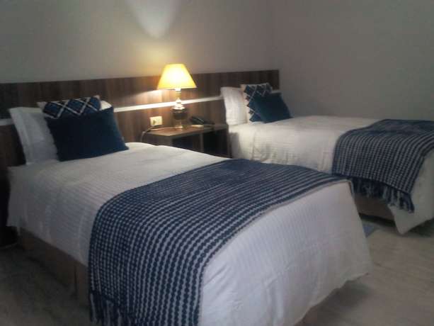 Imagen de la habitación del Hotel La Tour Boutique. Foto 12