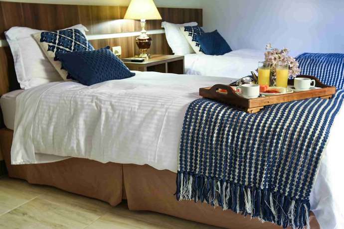 Imagen de la habitación del Hotel La Tour Boutique. Foto 16