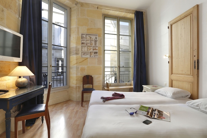 Imagen de la habitación del Hotel La Tour Intendance. Foto 12