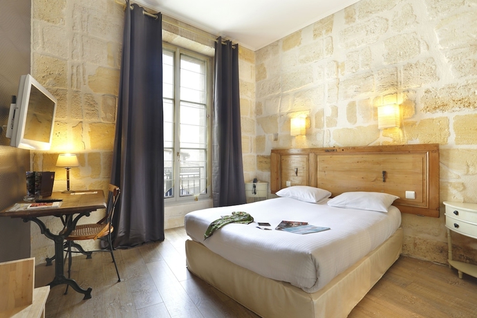 Imagen de la habitación del Hotel La Tour Intendance. Foto 14