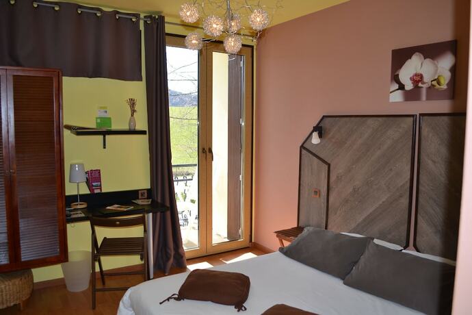 Imagen de la habitación del Hotel La Tour du Loup. Foto 13
