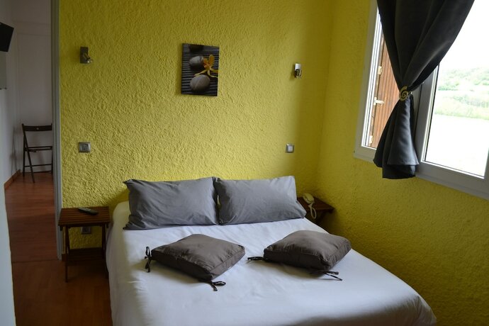 Imagen de la habitación del Hotel La Tour du Loup. Foto 16