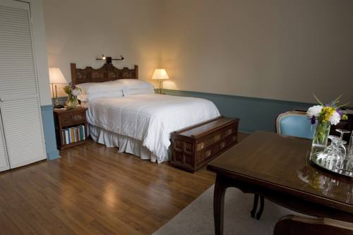Imagen de la habitación del Hotel La Tourelle Hotel & Spa. Foto 6