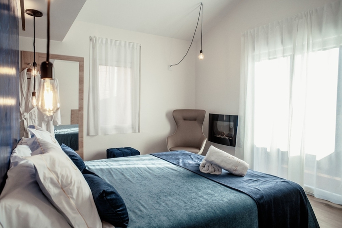 Imagen de la habitación del Hotel La Trobada Boutique. Foto 10