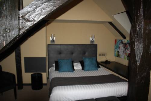 Imagen de la habitación del Hotel La Truffe Noire. Foto 8
