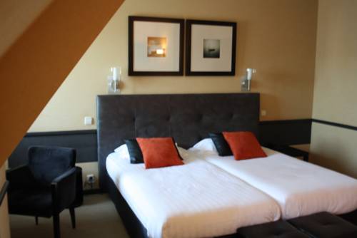 Imagen de la habitación del Hotel La Truffe Noire. Foto 11