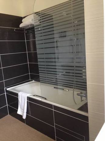 Imagen de la habitación del Hotel La Truffe Noire. Foto 12