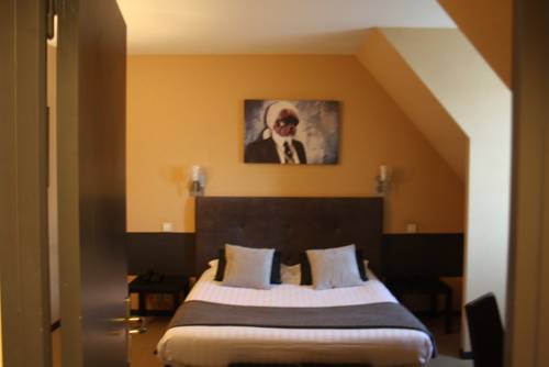 Imagen de la habitación del Hotel La Truffe Noire. Foto 14