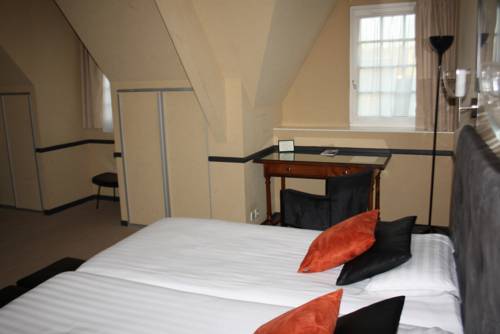 Imagen de la habitación del Hotel La Truffe Noire. Foto 15