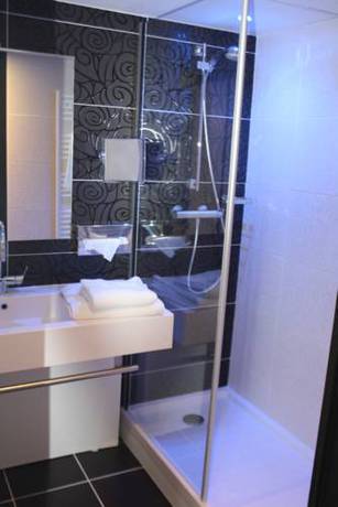 Imagen de la habitación del Hotel La Truffe Noire. Foto 16