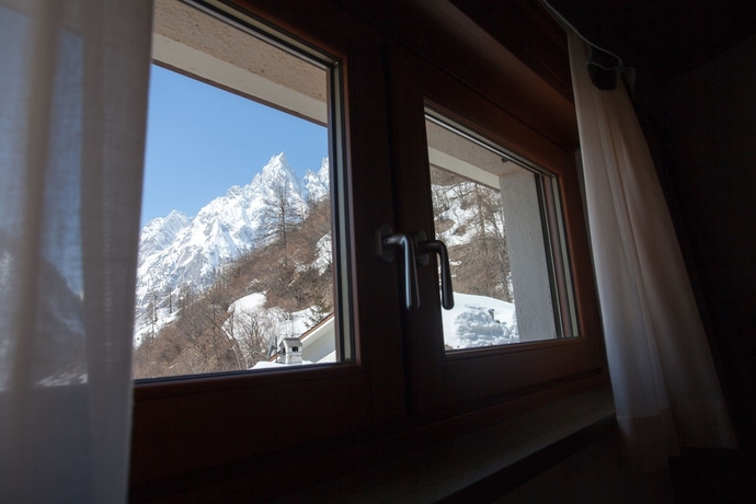 Imagen de la habitación del Hotel La Vallee Blanche, Courmayeur. Foto 6