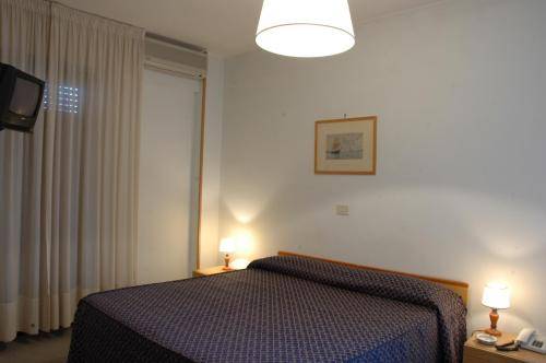 Imagen de la habitación del Hotel La Vela, Passignano Sul Trasimeno. Foto 10