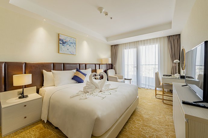 Imagen de la habitación del Hotel La Vela Saigon. Foto 4