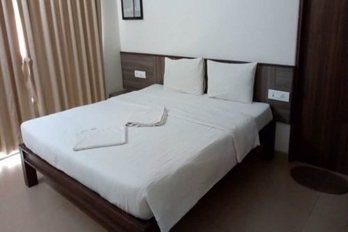 Imagen de la habitación del Hotel La Vida Studio Inn. Foto 20