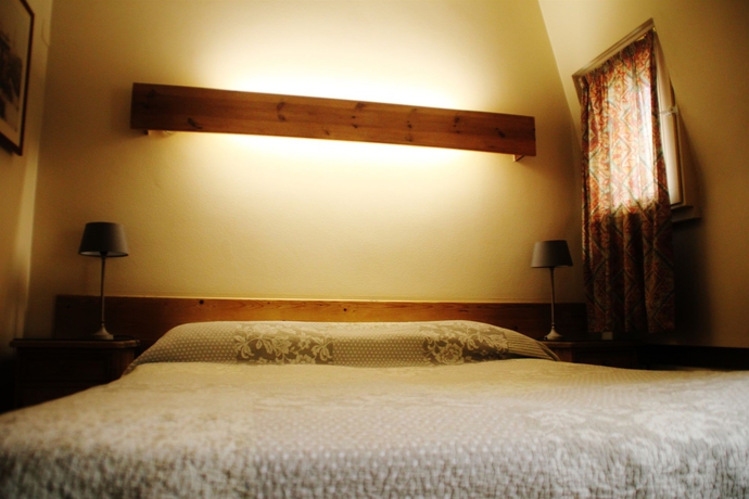 Imagen de la habitación del Hotel La Vieille Lanterne. Foto 8