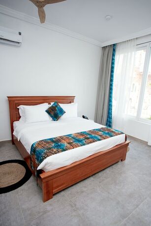 Imagen de la habitación del Hotel La Villa Aphro Ghana. Foto 13