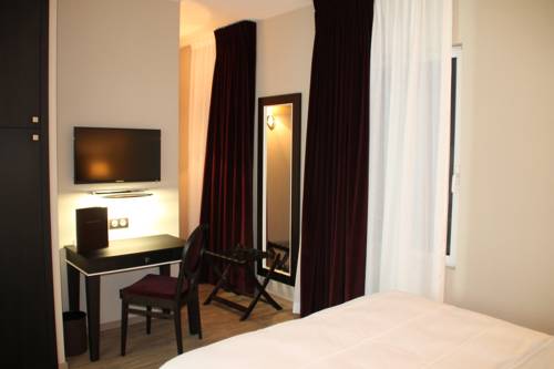 Imagen de la habitación del Hotel La Villa De L'ecluse. Foto 4