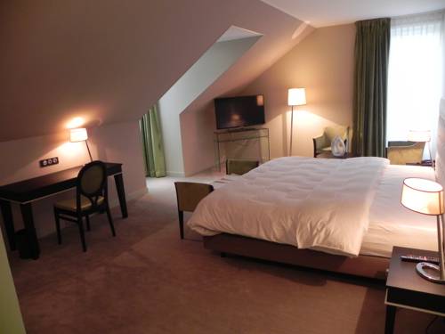 Imagen de la habitación del Hotel La Villa De L'ecluse. Foto 6