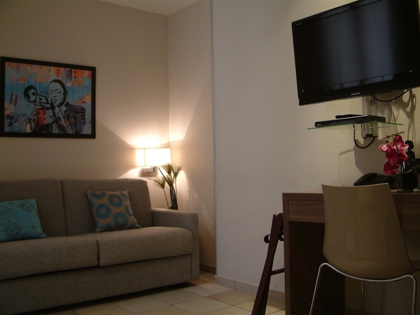Imagen de la habitación del Hotel La Villa D'elsa. Foto 11