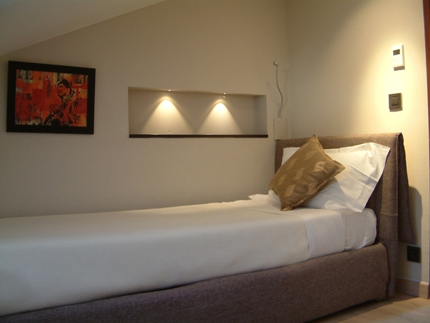 Imagen de la habitación del Hotel La Villa D'elsa. Foto 13