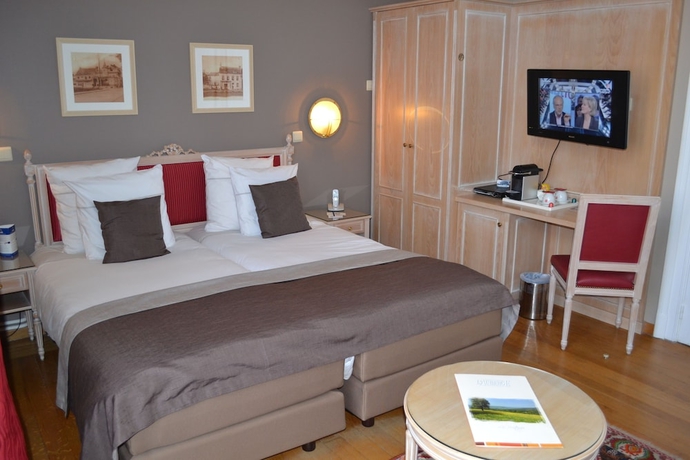 Imagen de la habitación del Hotel La Villa Des Fleurs. Foto 9