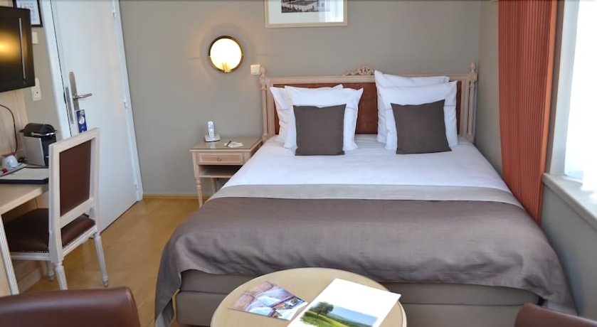 Imagen de la habitación del Hotel La Villa Des Fleurs. Foto 11