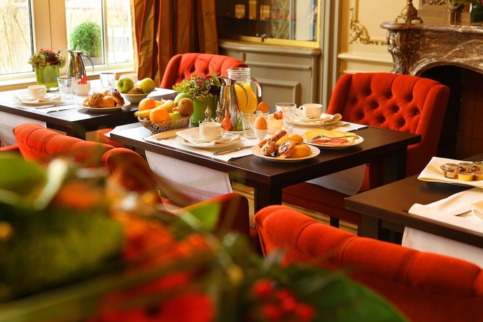 Imagen del bar/restaurante del Hotel La Villa Des Fleurs. Foto 5