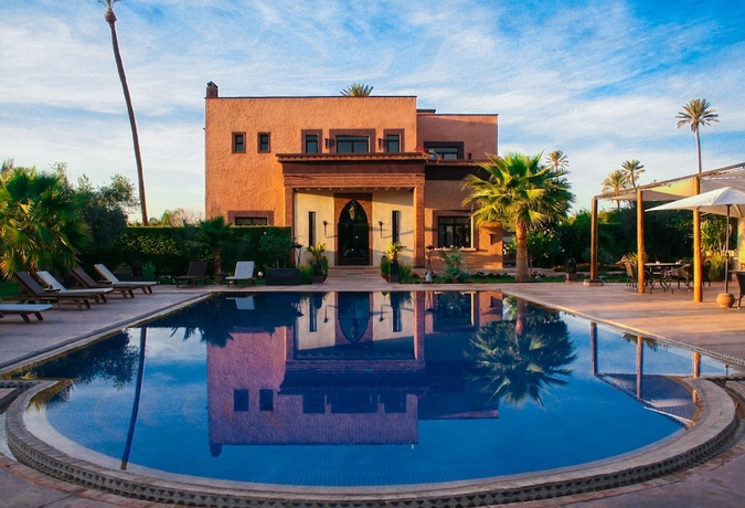 Imagen de la habitación del Hotel La Villa Des Golfs. Foto 3