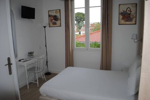 Imagen de la habitación del Hotel La Villa Des Oliviers. Foto 12