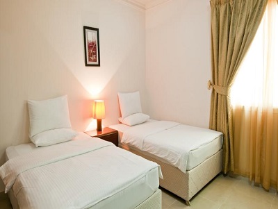 Imagen de la habitación del Hotel La Villa Inn Apartments. Foto 4