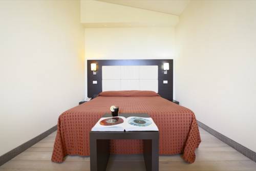 Imagen de la habitación del Hotel La Villa Resort. Foto 5