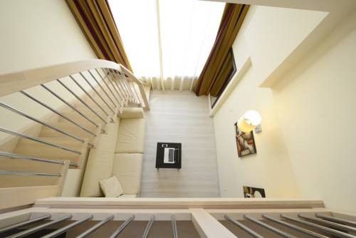 Imagen de la habitación del Hotel La Villa Resort. Foto 7