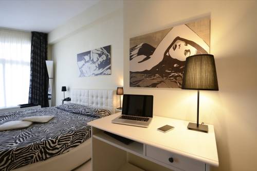 Imagen de la habitación del Hotel La Villa Resort. Foto 14