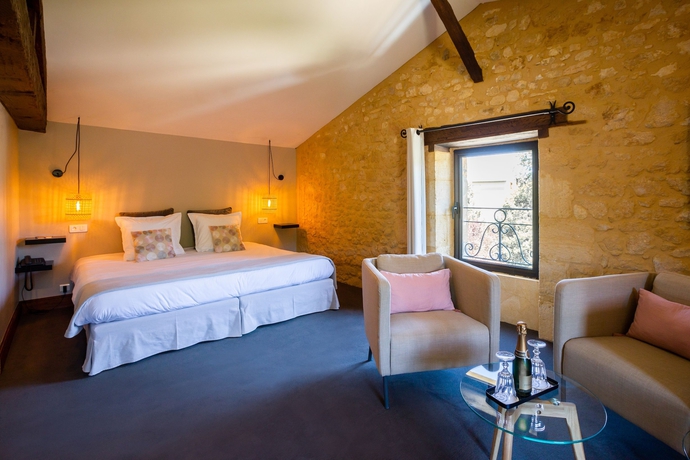 Imagen de la habitación del Hotel La Villa Romaine. Foto 5