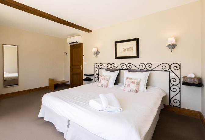 Imagen de la habitación del Hotel La Villa Romaine. Foto 9