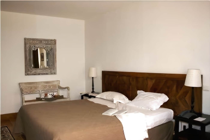 Imagen de la habitación del Hotel La Villa Romaine. Foto 13