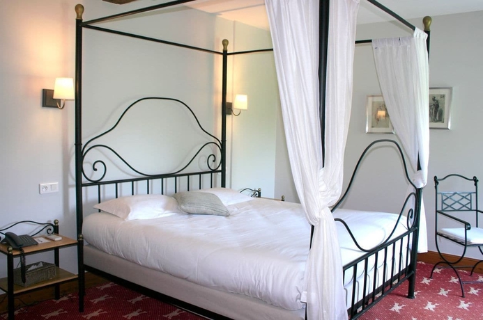 Imagen de la habitación del Hotel La Villa Romaine. Foto 16