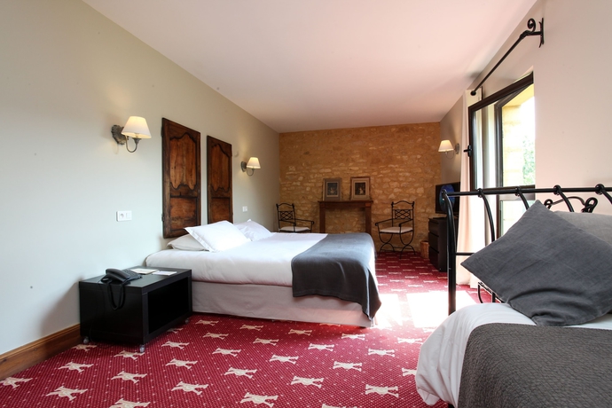 Imagen de la habitación del Hotel La Villa Romaine. Foto 17