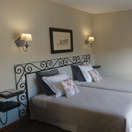 Imagen de la habitación del Hotel La Villa Romaine. Foto 18